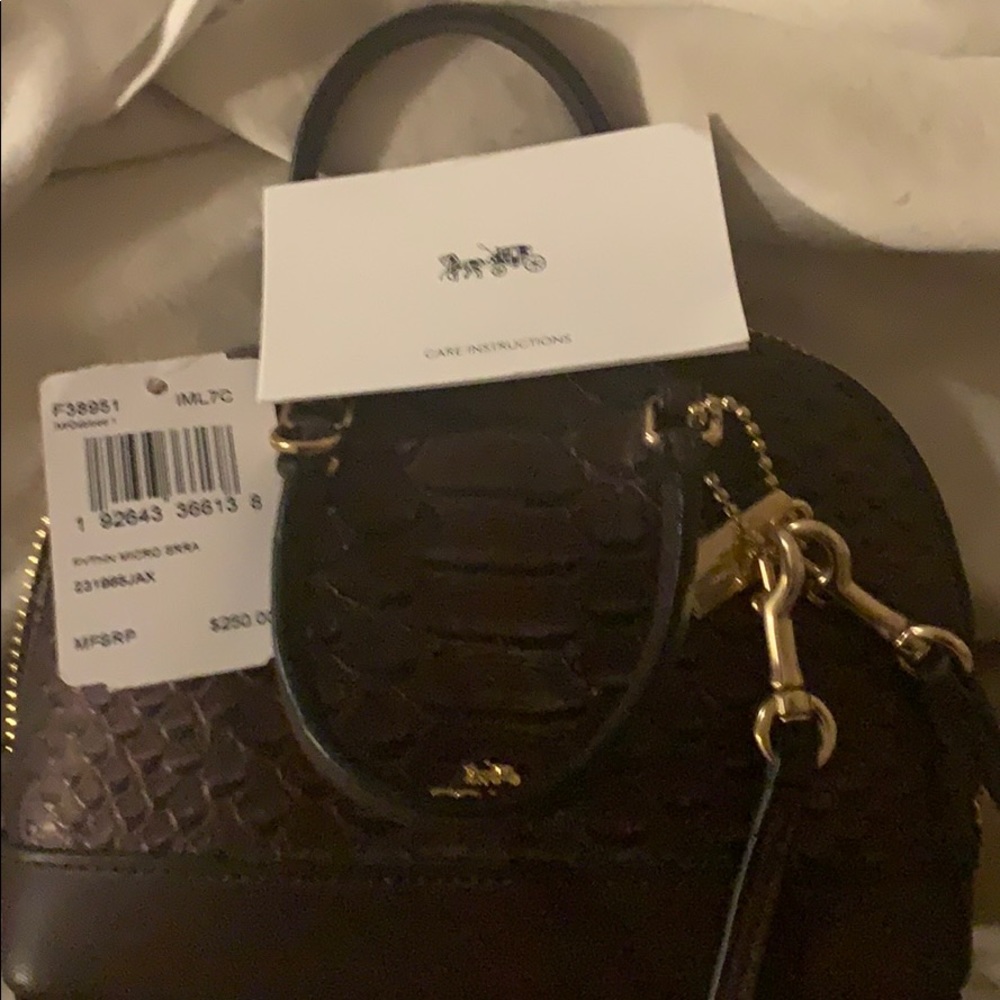 Rand new small coach shoulder purse